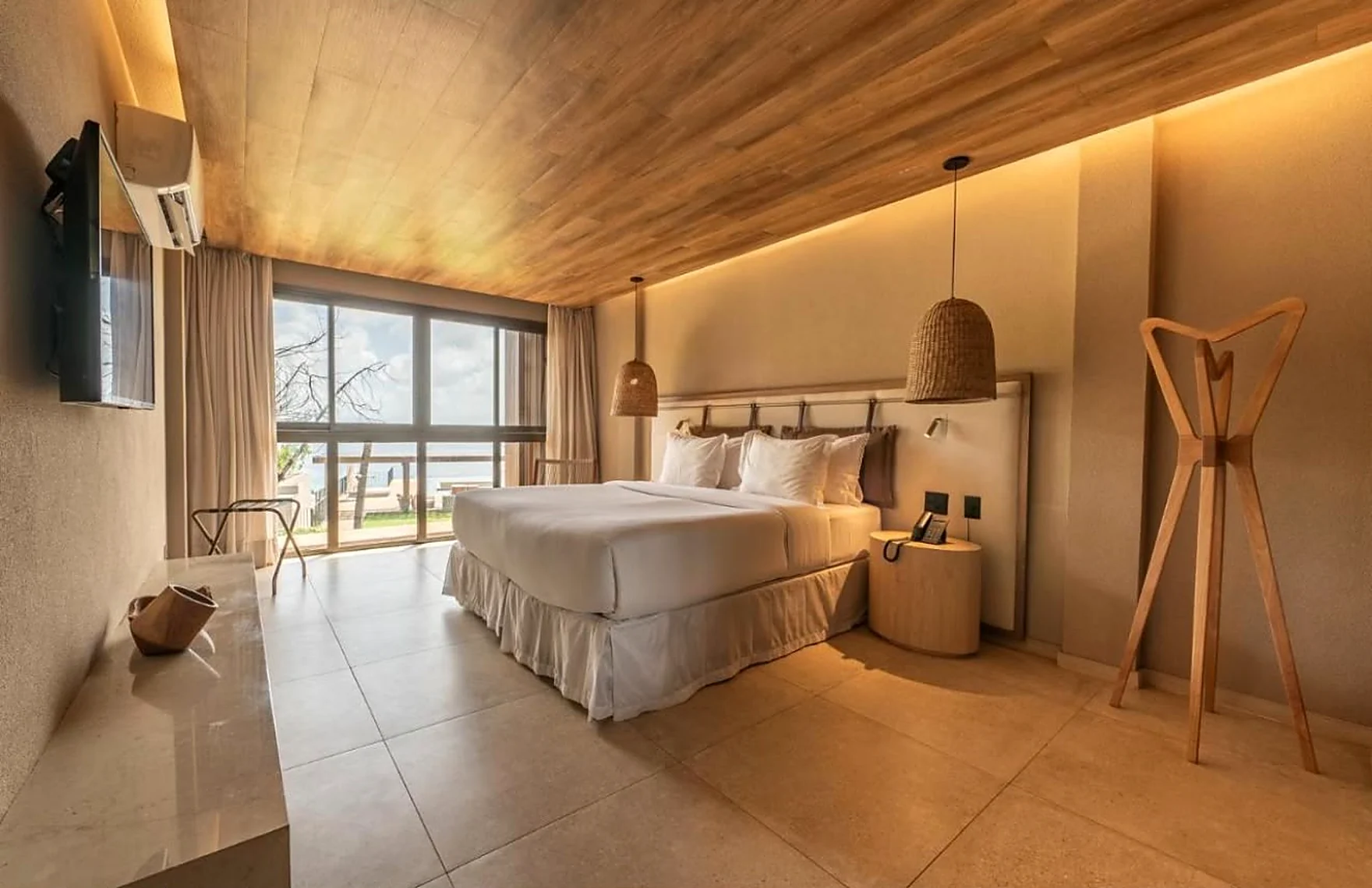 Apartamento Luxo com cama king e iluminação natural