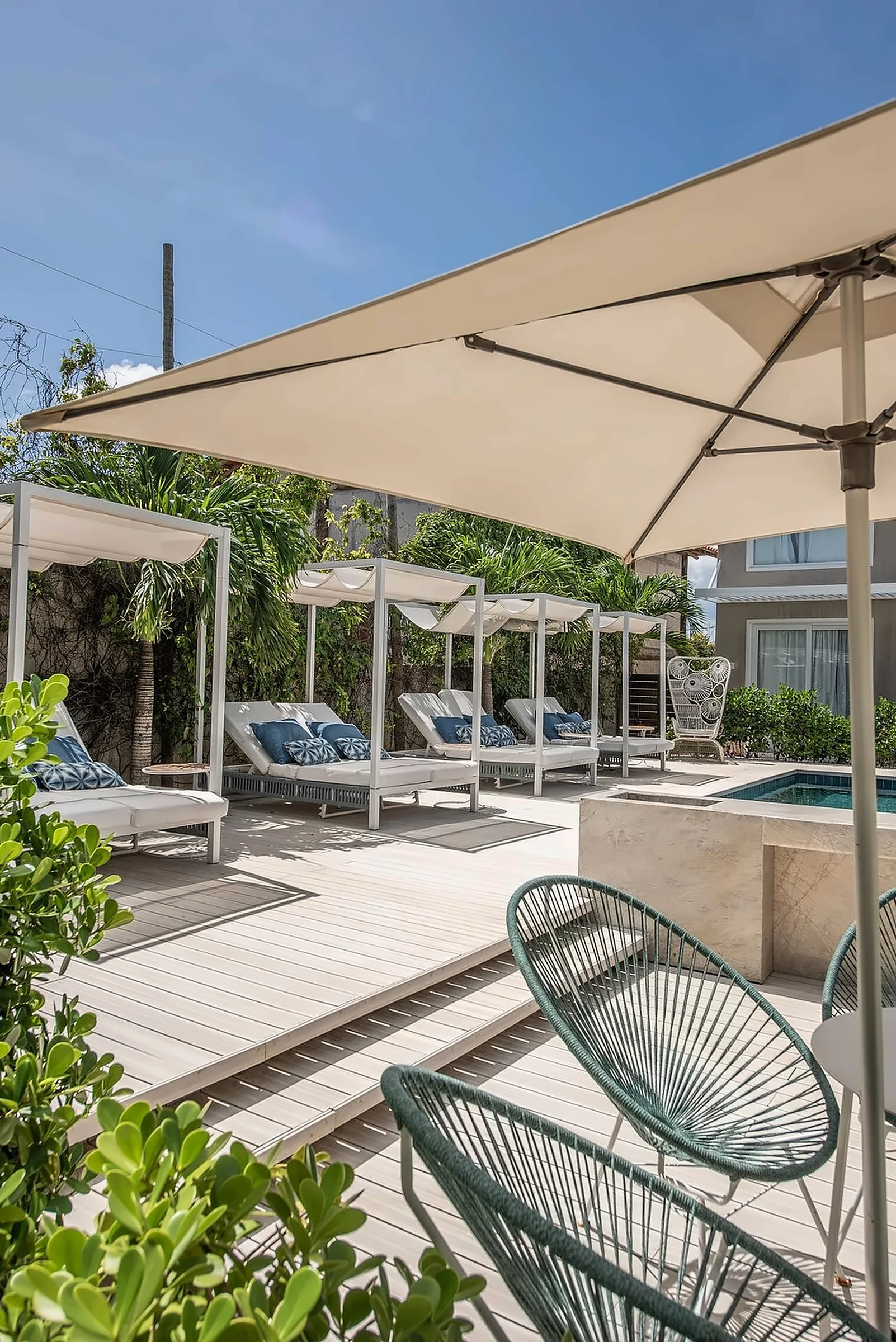 Shaded deck and leisure area at the property